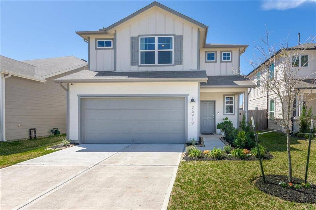 Adorable curb appeal with upgraded street numbers, lighting, and landscaping.