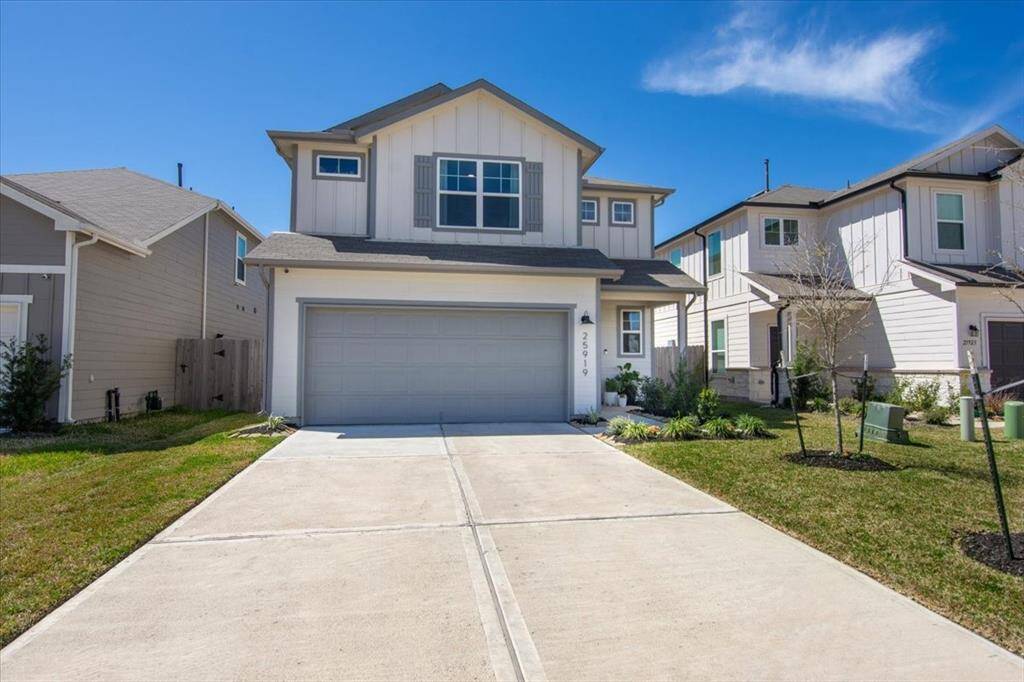 Adorable curb appeal with upgraded street numbers, lighting, and landscaping.