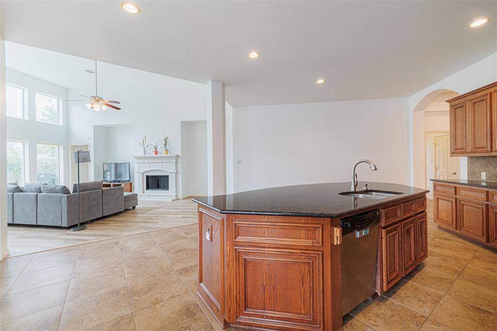 The kitchen is open to the family room.