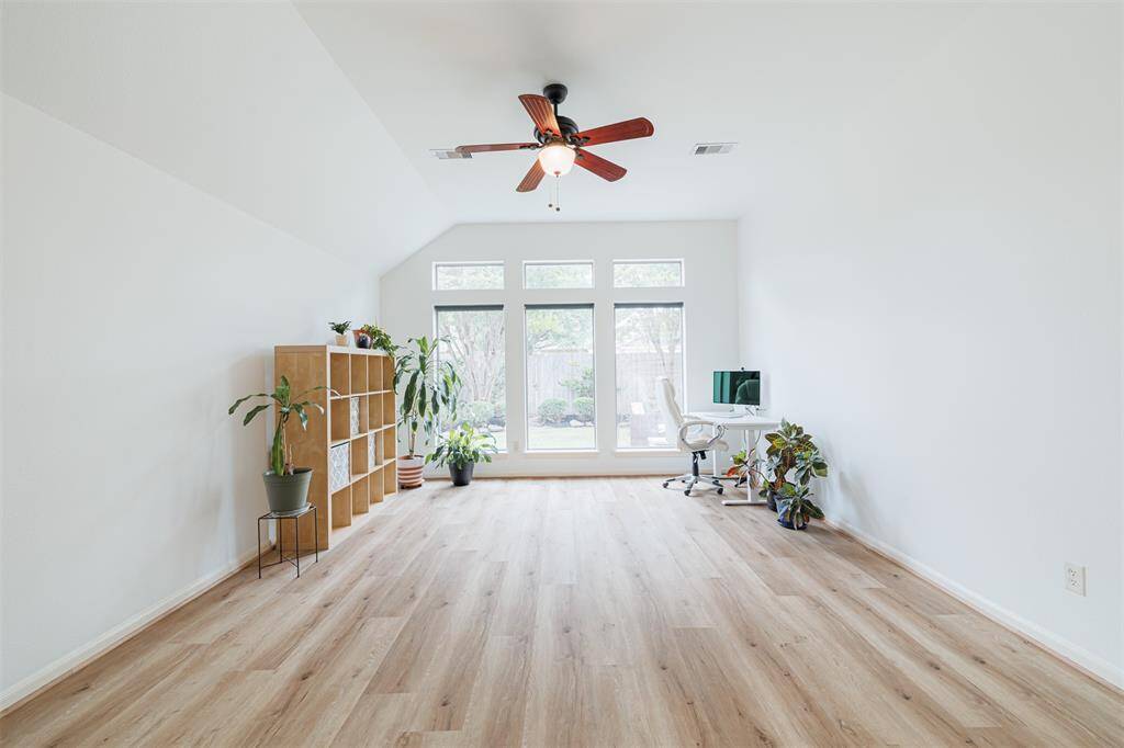 A versatile game room sits just off the kitchen.