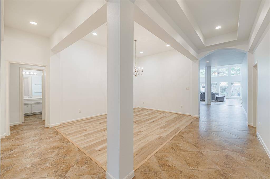 View of the family room and dining room from the front entry.