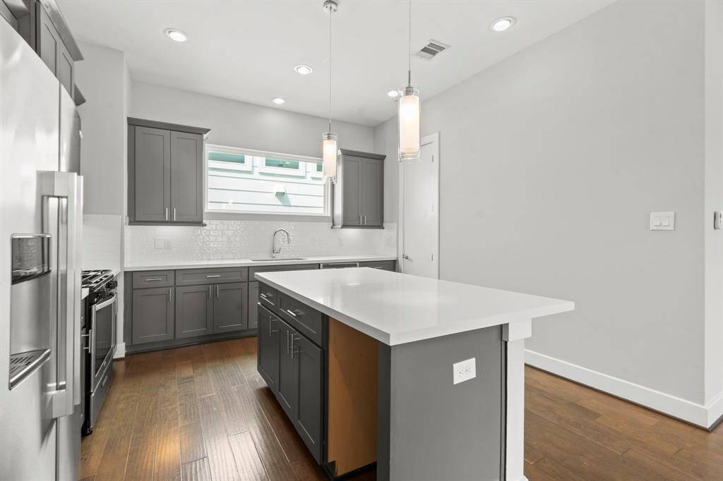 Space for mini fridge or wine cooler as well
