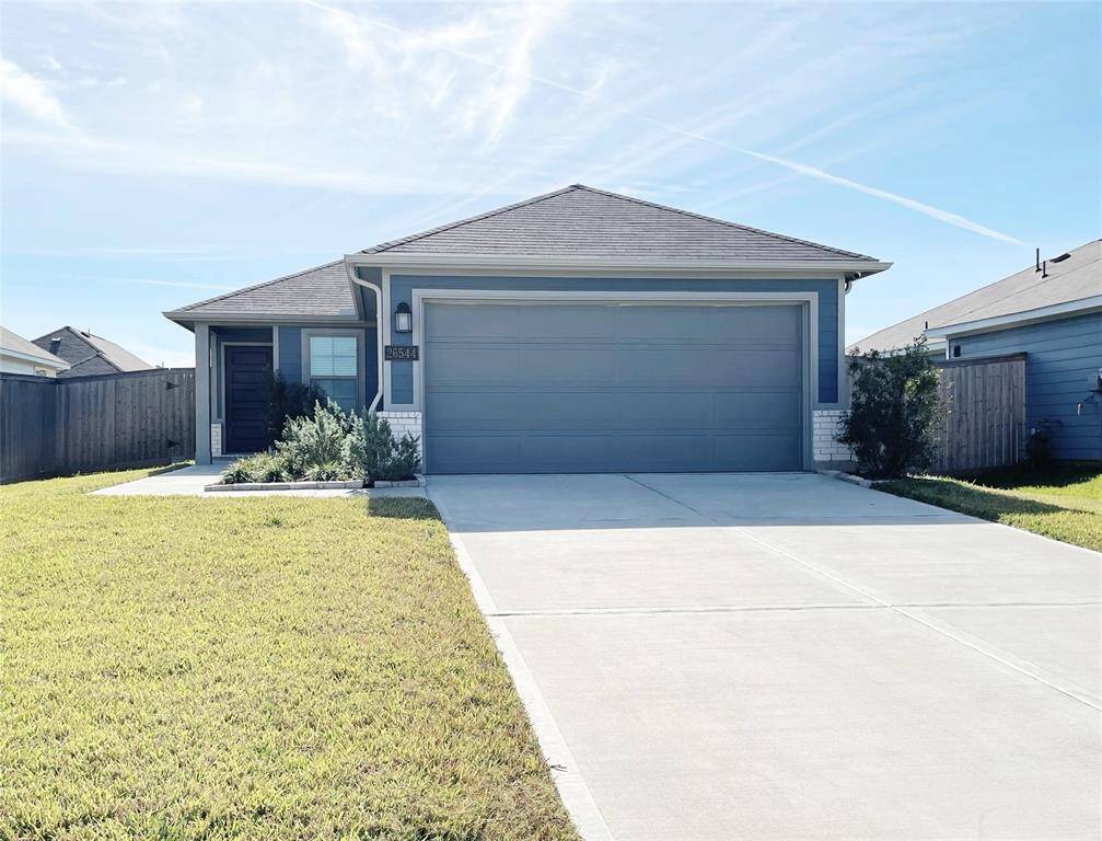 This home has a great extended driveway for parking multiple cars or trucks!