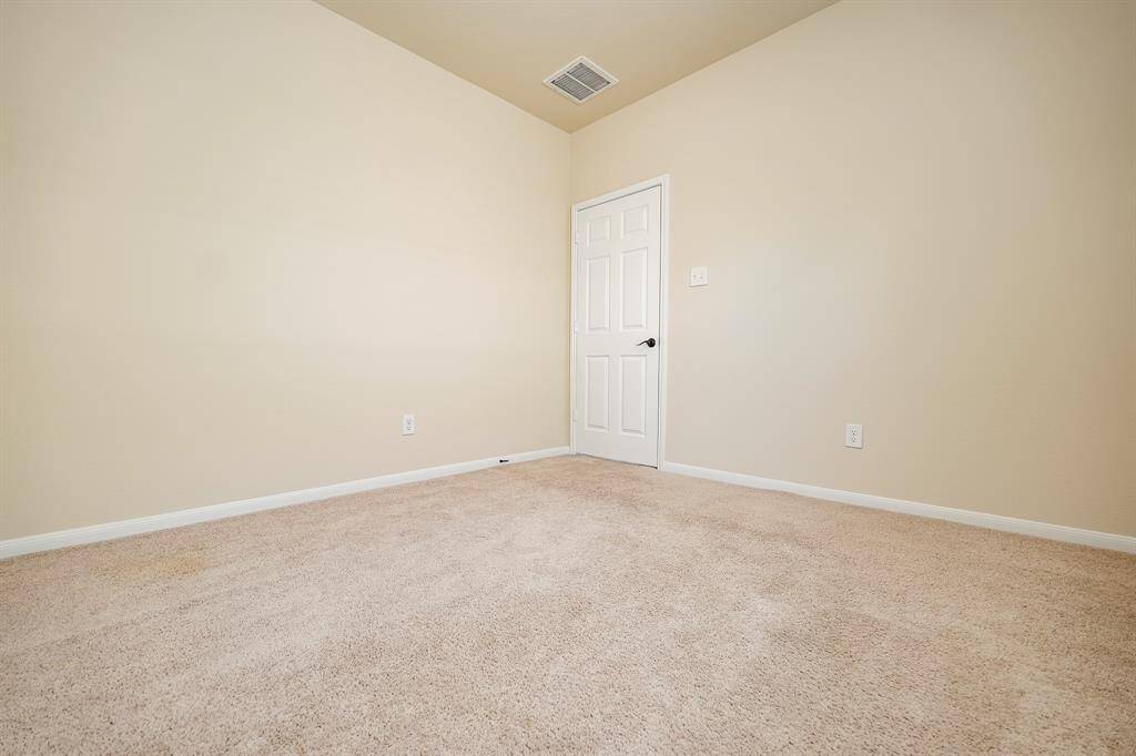 Take advantage of sharp corners for treasured accents and the creation of reading or hobby nooks in a spacious secondary bedroom.