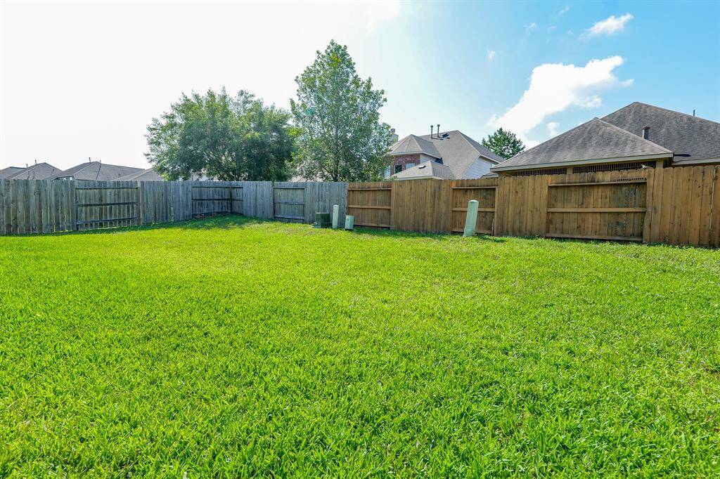 Sturdy privacy fencing surrounds your private patch of the greater outdoors.