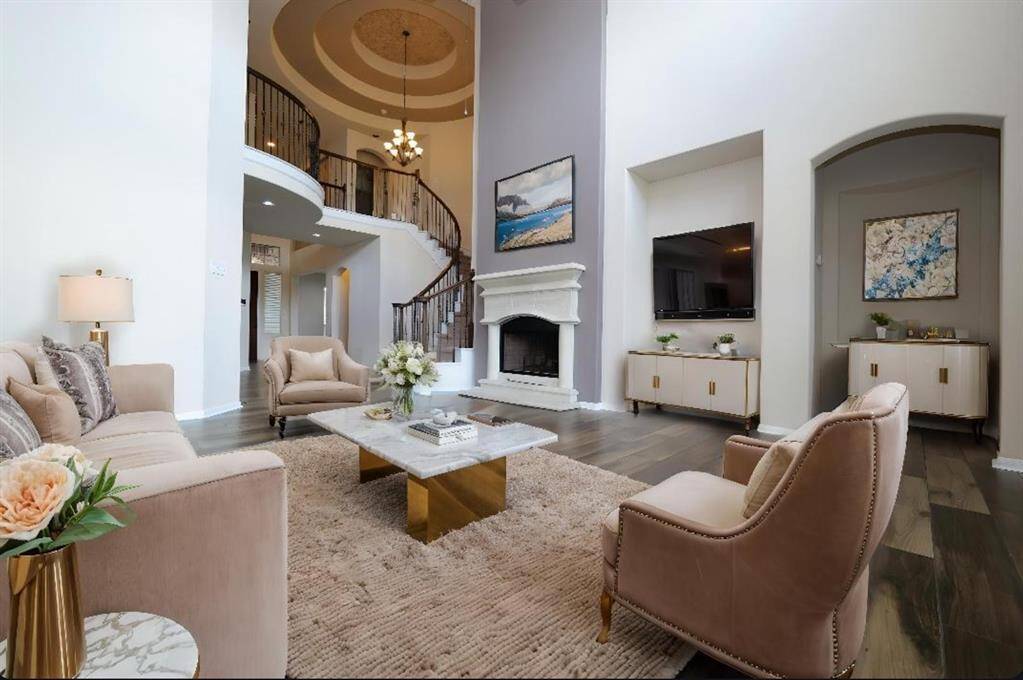 This Virtually Staged view of the living area will surely get your creative juices flowing for placement of treasured pieces, perhaps with attention to art niches and unique architectural structures.