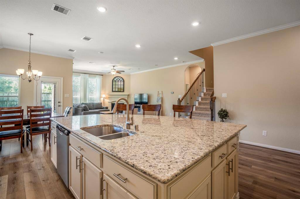 As you are in the Kitchen, you're still a part of the activity in the living areas