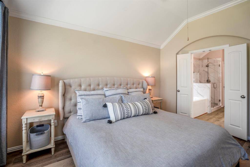Primary Bedroom with appealing architectural details