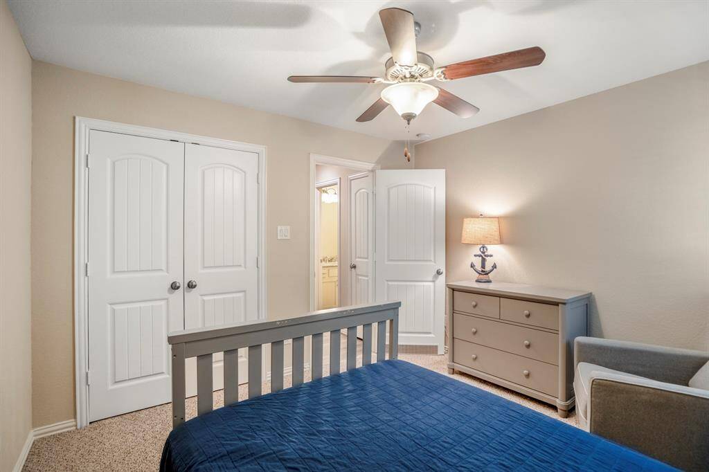 Neutral paint and high ceilings in all the bedrooms.