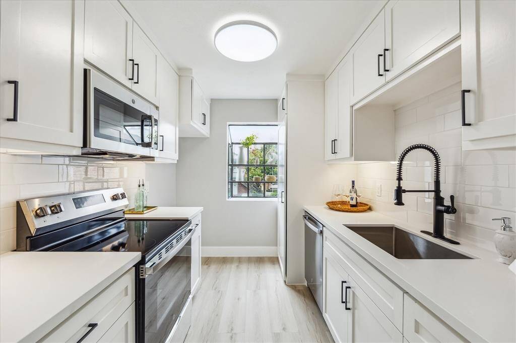 Welcome home! This remodeled 2 bedroom/2 bath condo offers luxurious amenities.