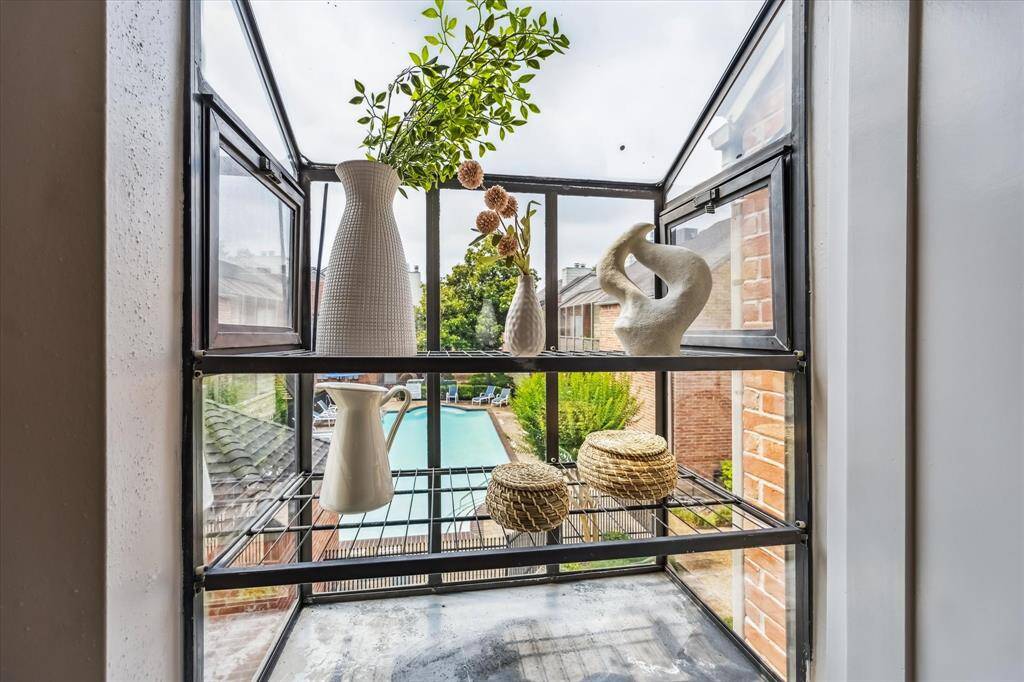 View to the main complex pool from the garden window!  Grow herbs for fresh ingredients while cooking!