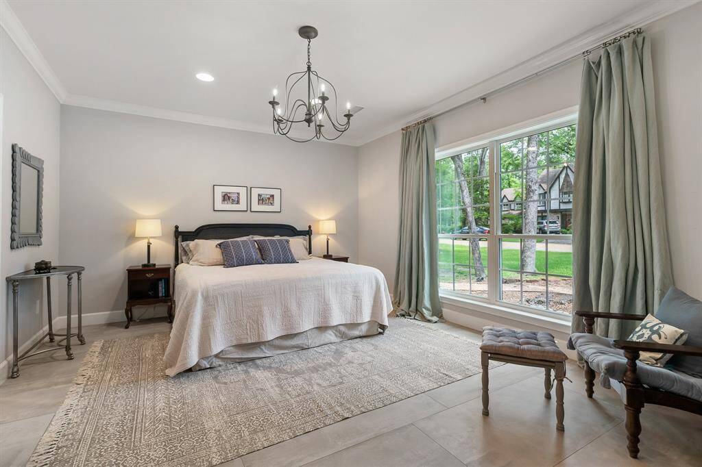 The primary suite has a large window, and all windows are new!  This room offers 9 foot ceilings.