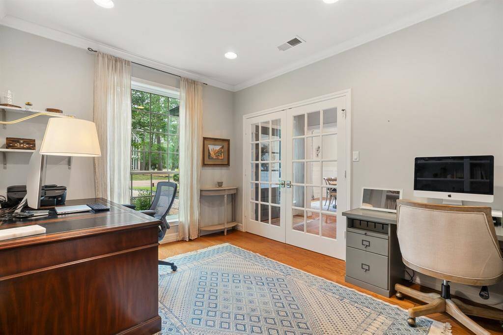 The study is on the opposite side of the foyer from the dining room.  This room also offers 9 foot ceilings!