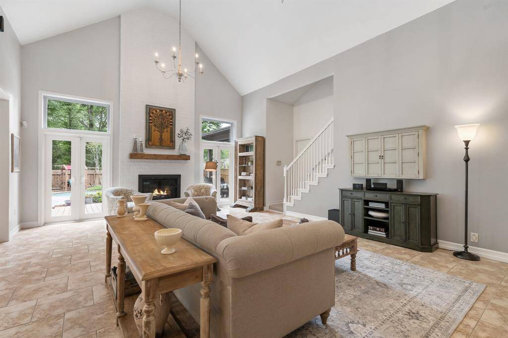 So fresh and airy throughout and this family room is the epitome of it all! The 18 foot ceilings add grandeur to the room!