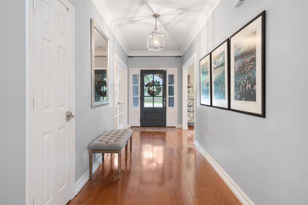 A view of the foyer looking from the family room area....notice the distance between the front door and the family room allowing some privacy.