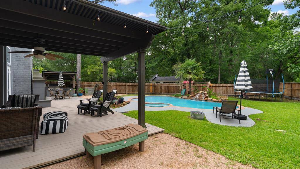 This covered patio offers relief from the sun when needed and protection from the rain....