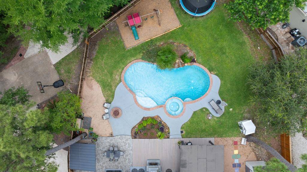 Notice all the fun things to do in this backyard!
