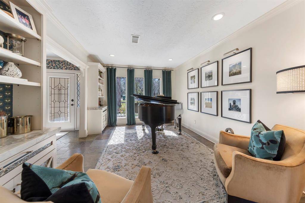 Front formal currently as a formal living can also be study or dining