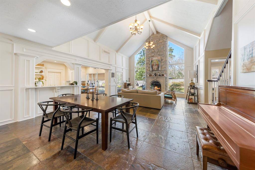 Breathtaking light from floor to ceiling windows, custom millwork and open concept with high ceilings