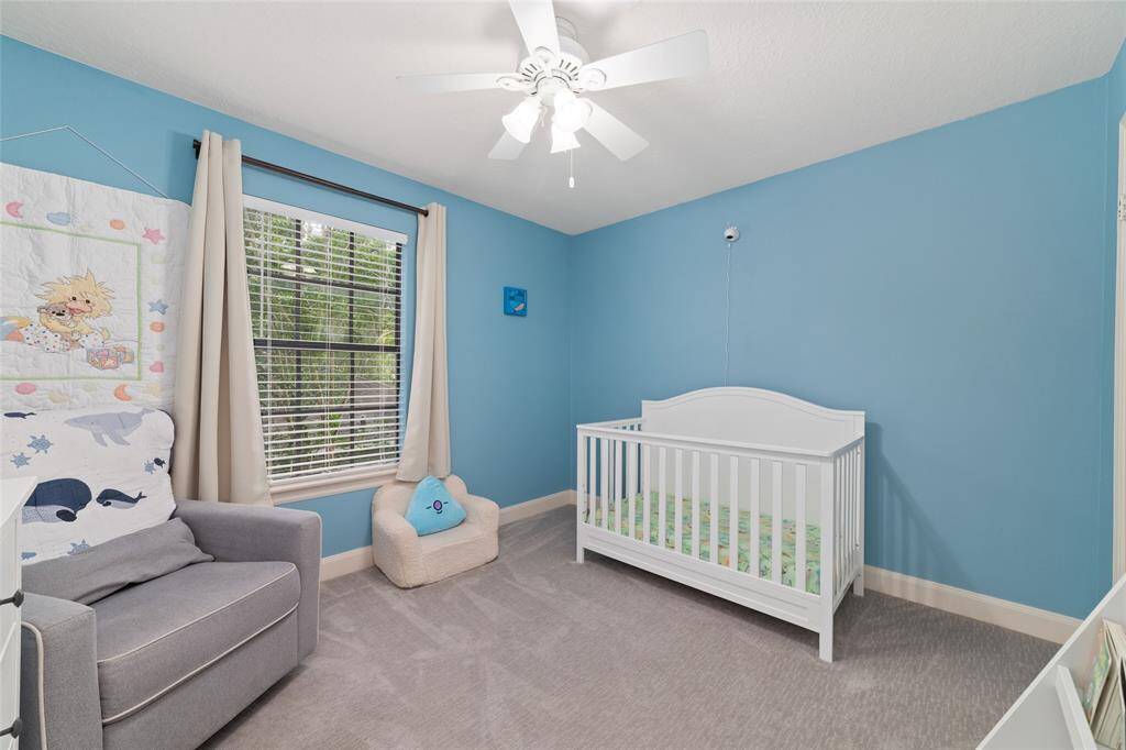 Secondary bedroom with reach-in closet.