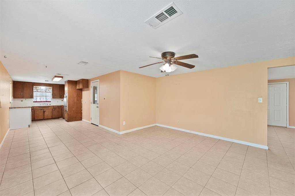 This view shows the grand space entertaining space of the kitchen living room combo. This area is perfect for entertaining.
