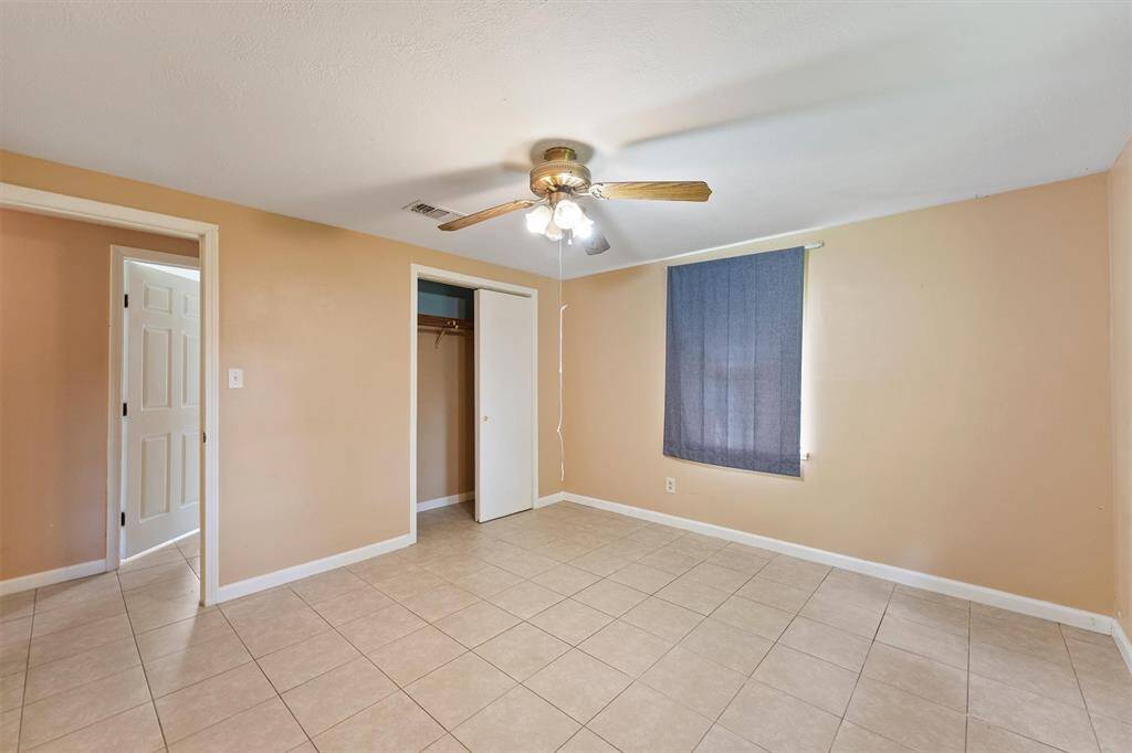 The primary bedroom offers ample space for your dream oasis to come to life.