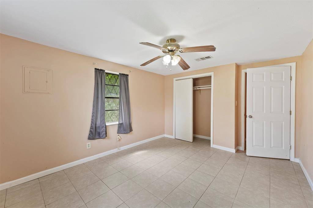The first bedroom the home offers includes a closet.