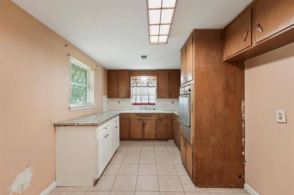 Another view of the galley style kitchen.