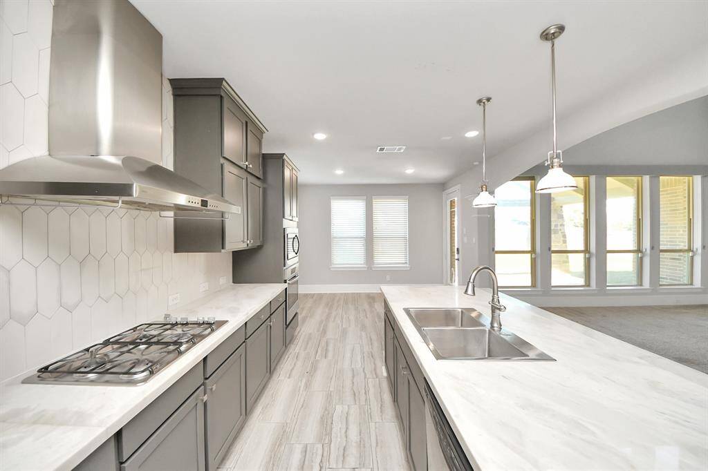 kitchen with updated stainless steel appliances