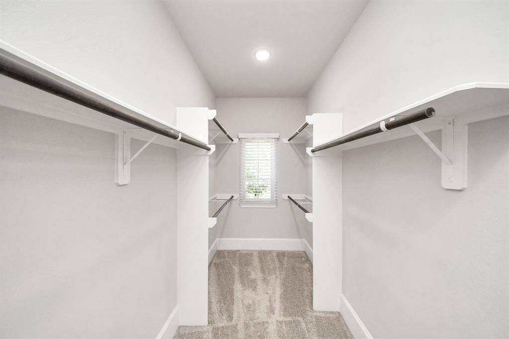 spacious primary walk in closet