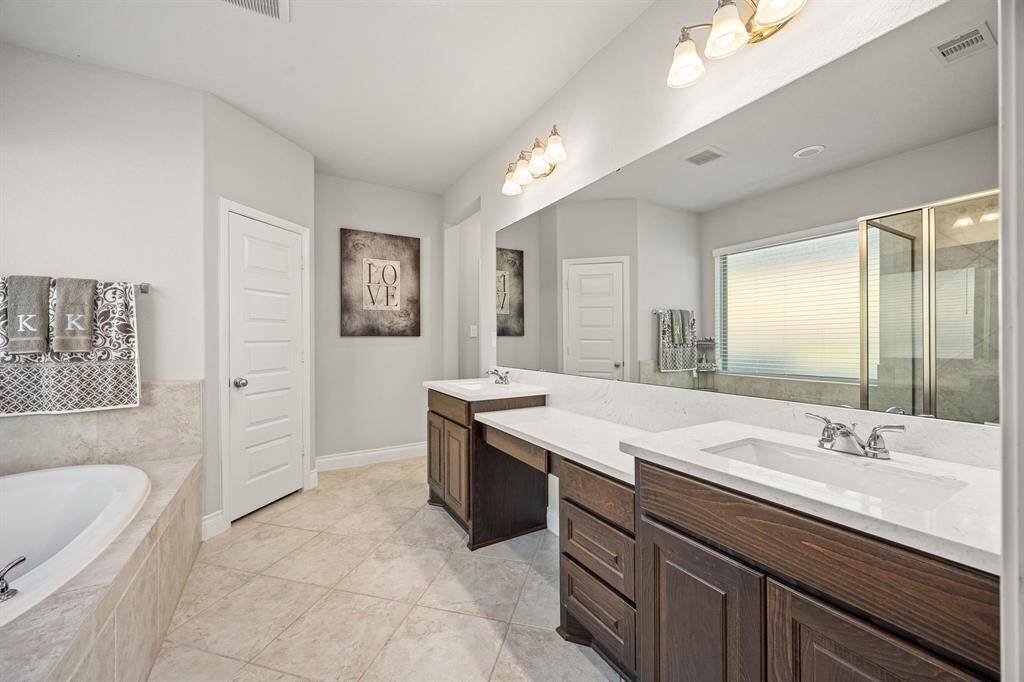 Primary Bath With His/Her Sinks, Vanity Area, Large Jacuzzi Tub & Separate Shower