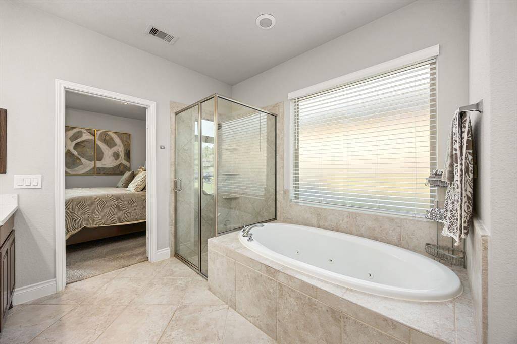 The Primary Bath Also Includes Spacious His/Her Closets