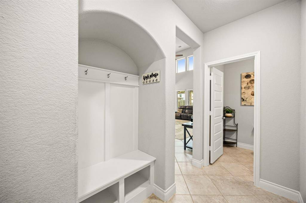 Laundry Room With Built-In Cabinets and Folding Table!