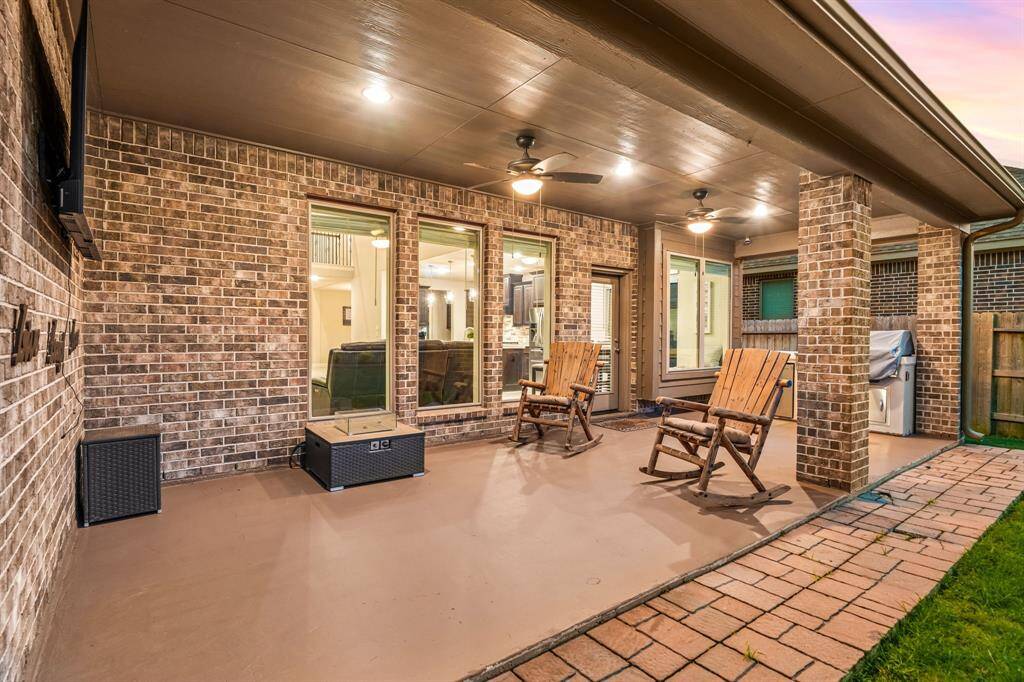 Large Covered Patio Space With Grill.