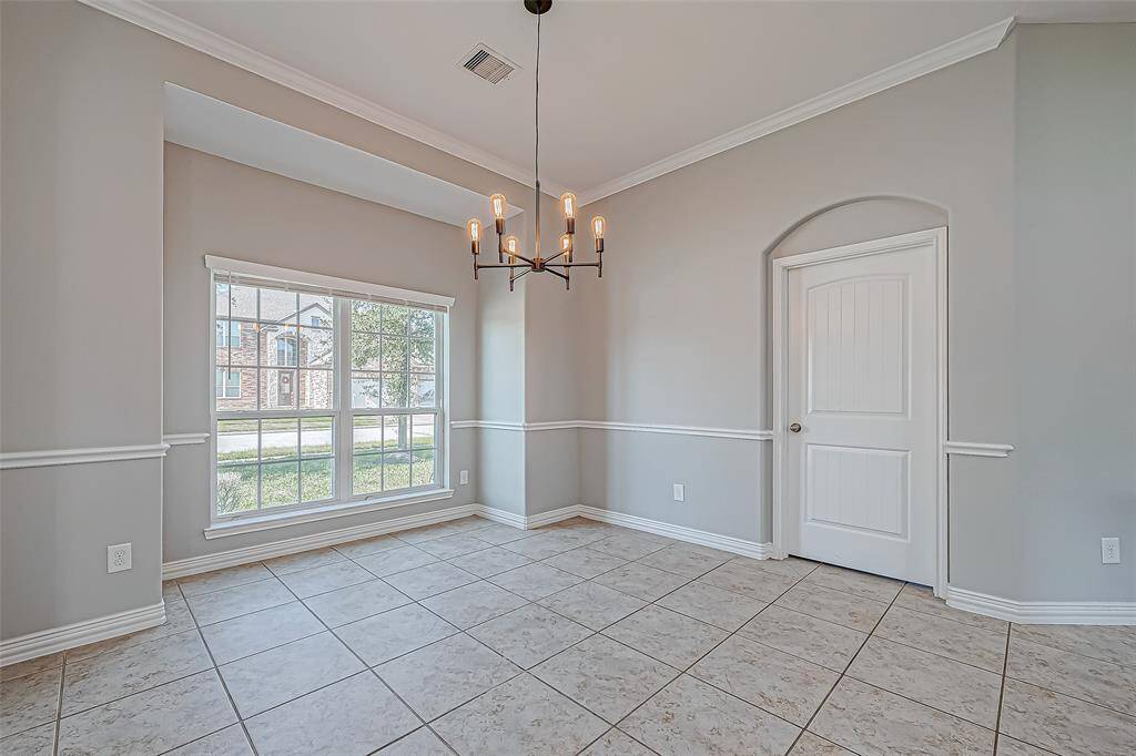 With a beautiful chandelier that sets the perfect ambiance for gatherings.