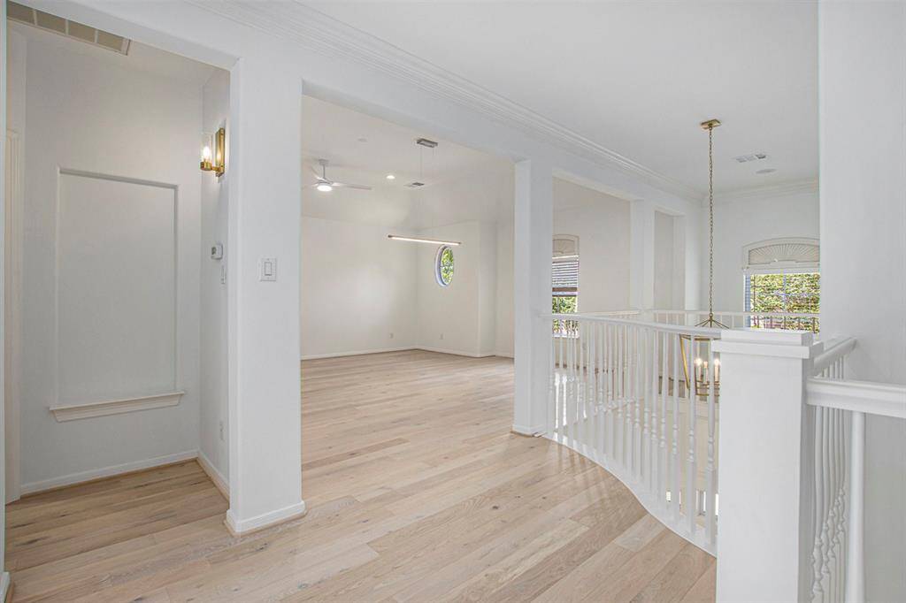 The upstairs feels so spacious with many different rooms to visit! This is a shot leading towards the big gameroom, which is large enough to fit a pool table.