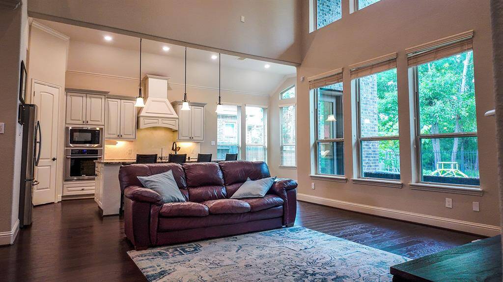 Living Room; Enjoy the towering trees from the comfort of your living room