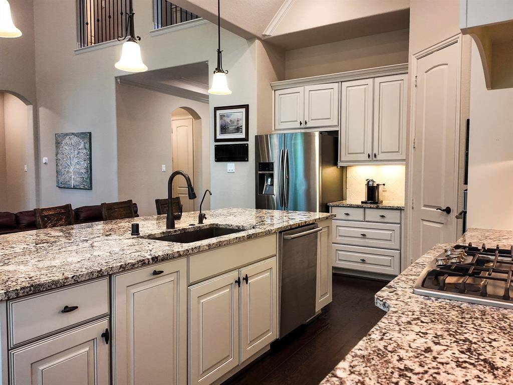 Kitchen sink with reverse osmosis, and gas cooktop