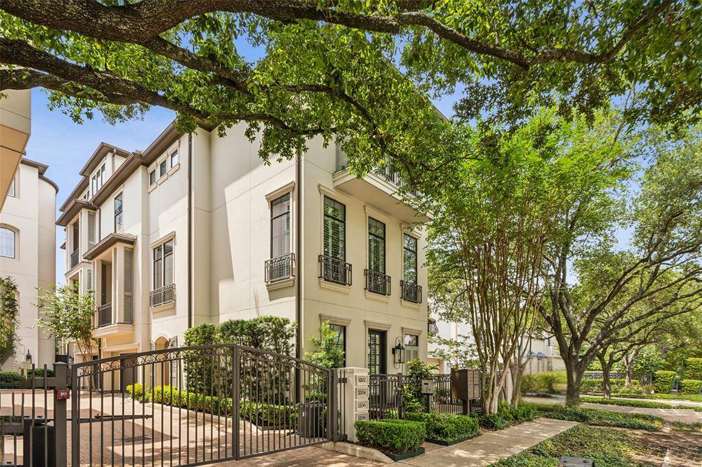 Exquisite 3-bedroom, 3.5-bath townhome in the prestigious gated enclave of Mid Lane Commons, crafted by renowned builder Pelican.