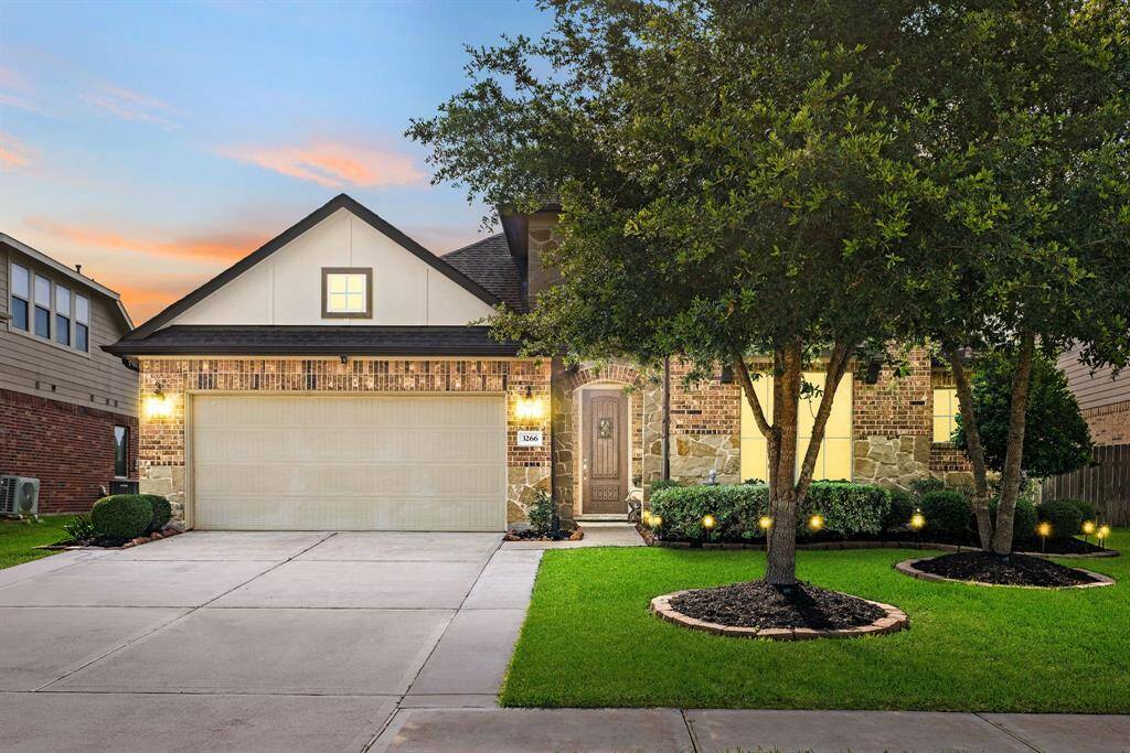 Welcome home to 3266 Karleigh Way located on a quiet street in McCray Meadows and zoned to Lamar Consolidated ISD! This stunning home has lovely curb appeal, a well-manicured lawn, beautiful landscaping, stone & brick elevation, dark stained front door with glass detailing, covered front porch, traditional style, beautiful outdoor lanterns and a double wide driveway!