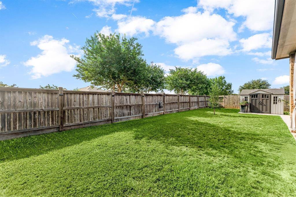 Come and see this spacious backyard with its beautiful covered patio. There is plenty of room for the kids to play and adults to relax! Perfect for your outdoor living space, patio furniture, bbq pit, and so much more. The possibilities are endless!