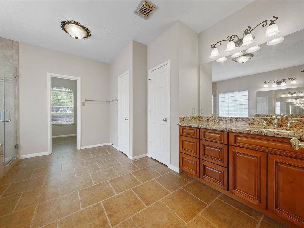 Separate sink and vanity area makes prepping to leave the house a breeze. Plenty of drawer and cabinet space in both areas.