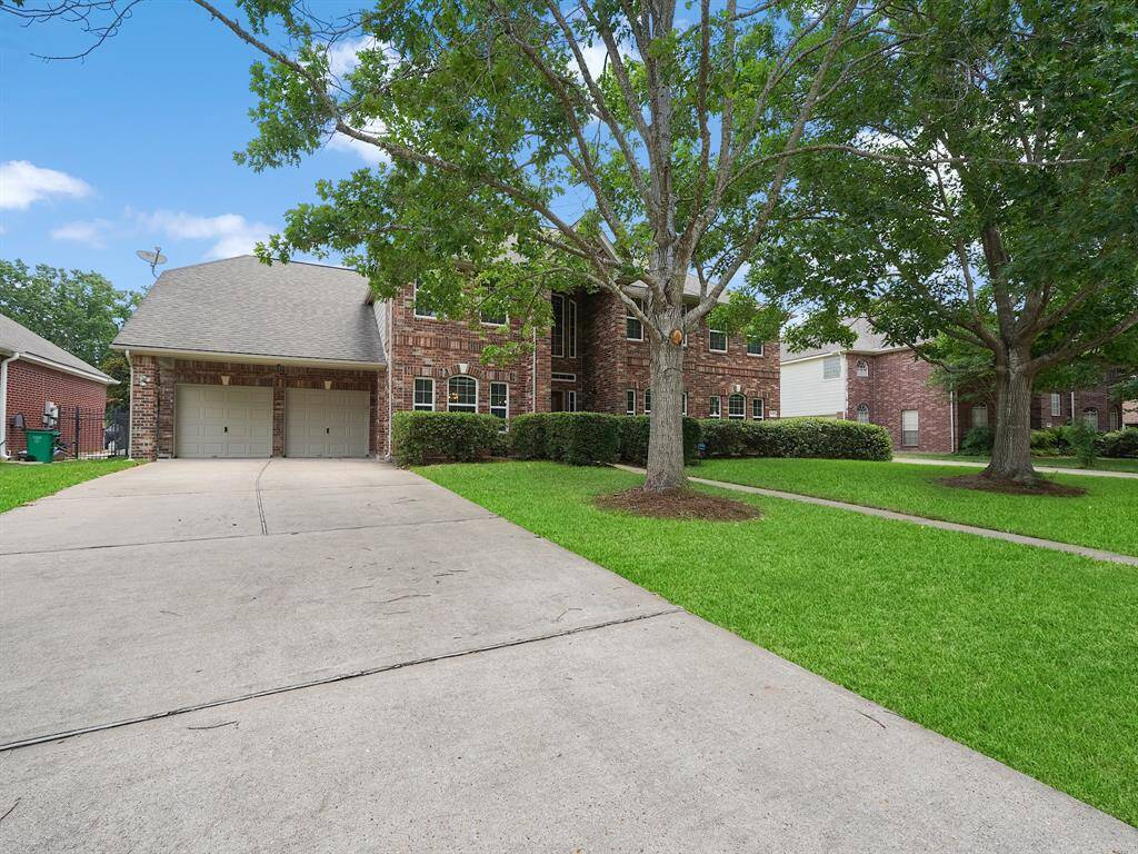 This 6 bedroom 4 full bath home is move in ready and on the golf course.