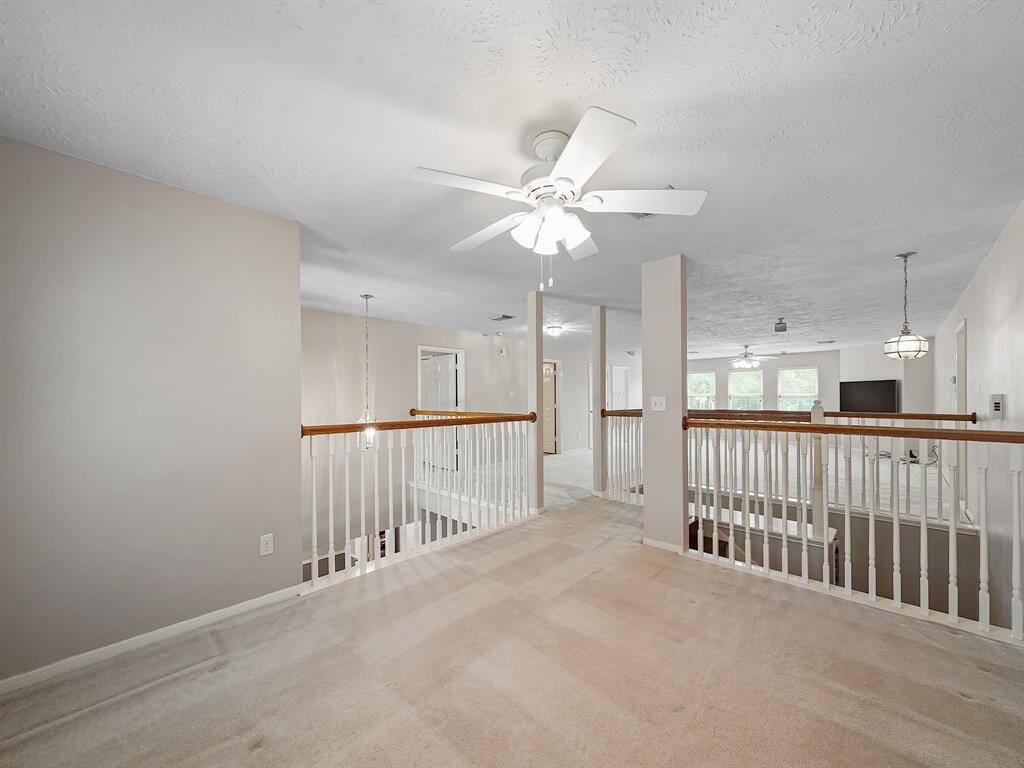 Loft-style game room located on the second floor.