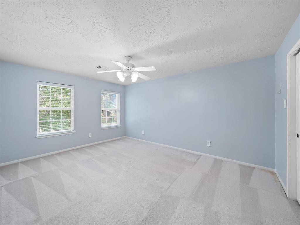 One of four secondary bedrooms located upstairs.