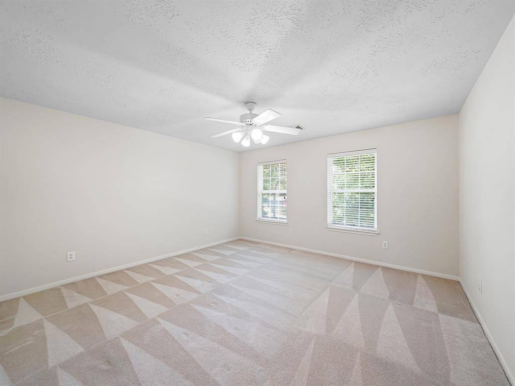 One of four secondary bedrooms located upstairs.