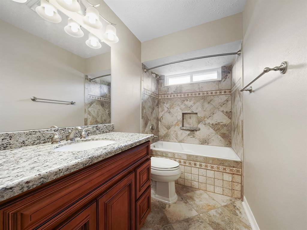 Secondary bath located upstairs with tub/shower combo.