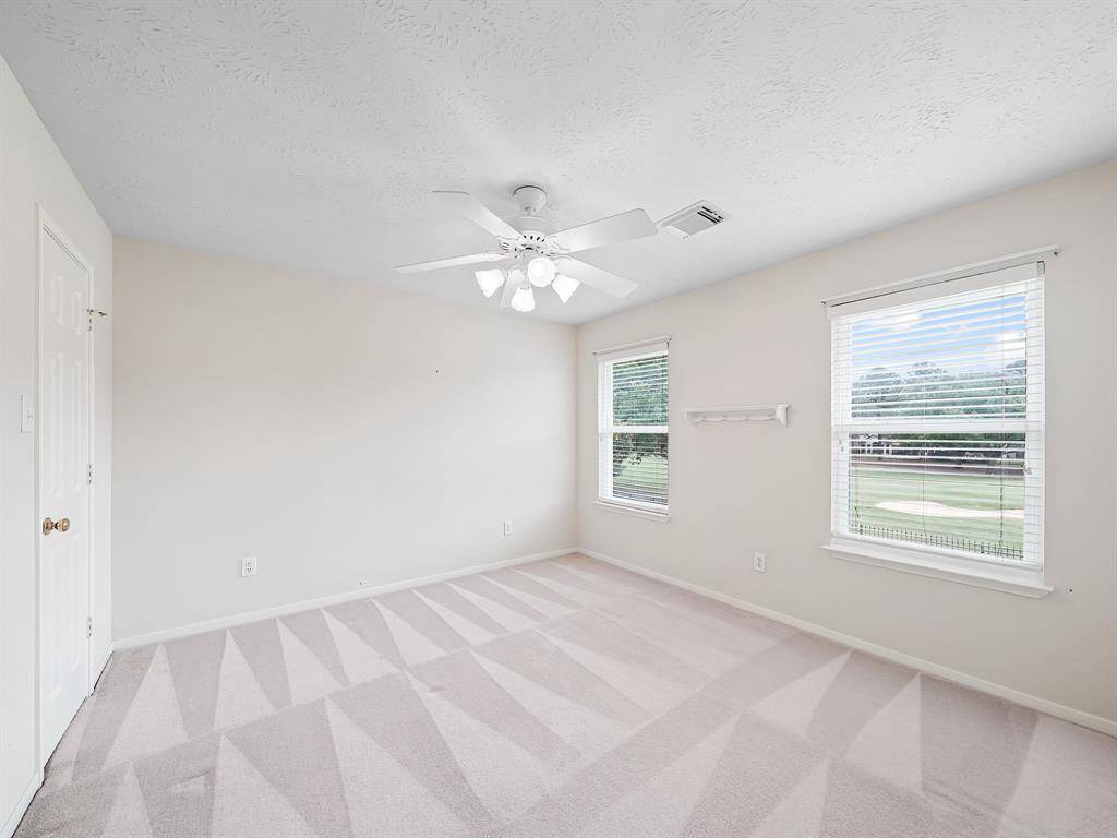 One of four secondary bedrooms located upstairs.
