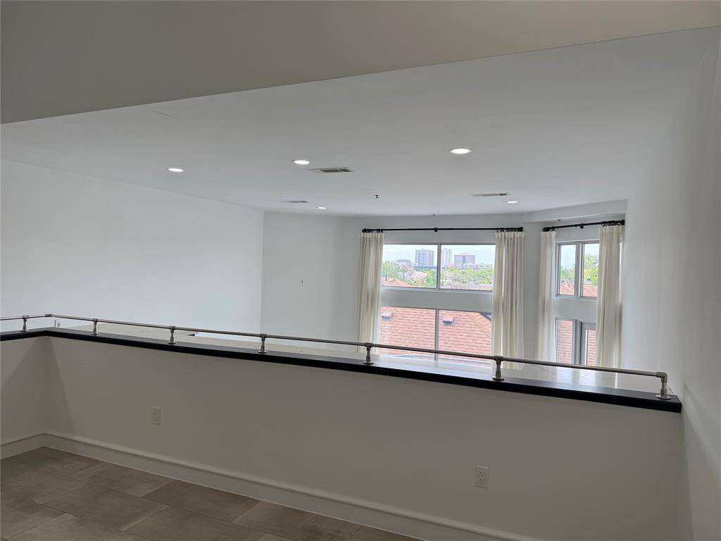 Bedroom with a skyline view