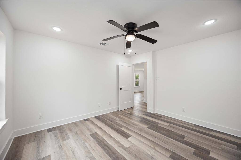Primary suite featuring recess lighting and stylish and a ceiling fan, offering a comfortable and versatile space for any setup.